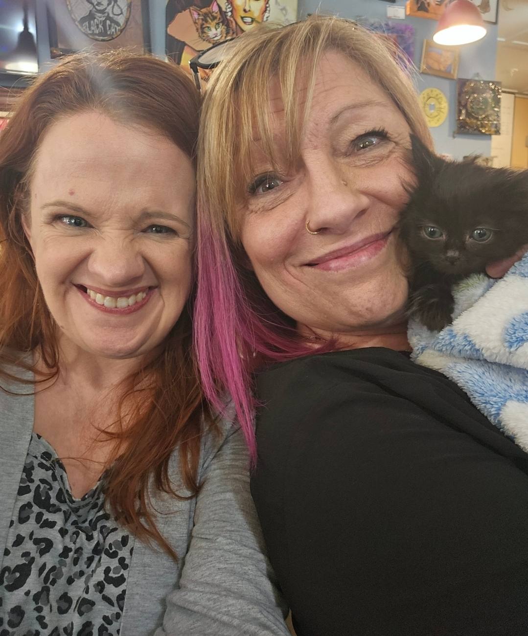 KJ with a tiny black kitten