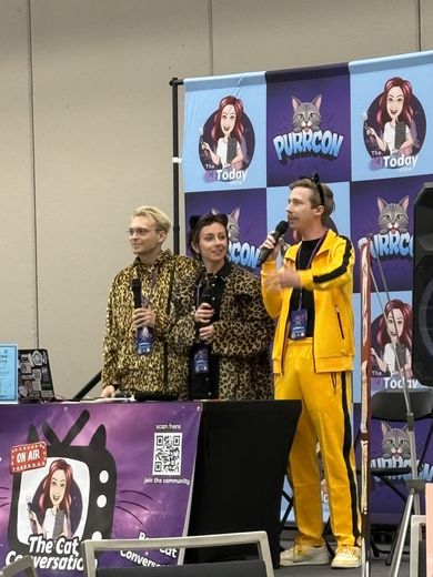 Cosplayers on The Cat Conversation stage at PurrCon