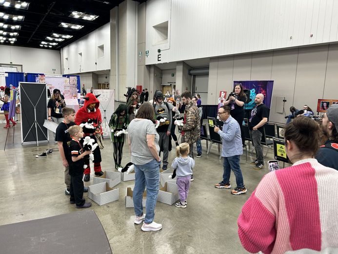 Crowd joining a round of Musical Cat Boxes on the PurrCon floor