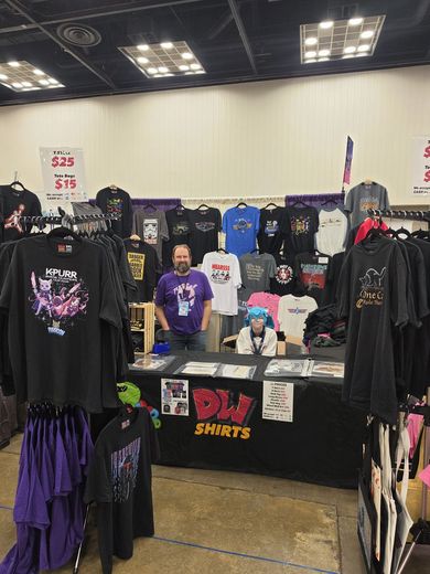 Cat-themed apparel booth at PurrCon