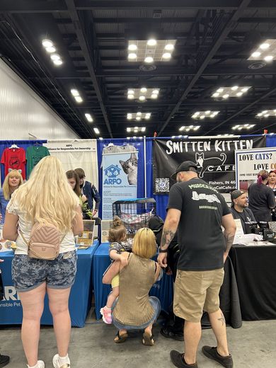 Families at the Smitten Kitten Cat Cafe booth